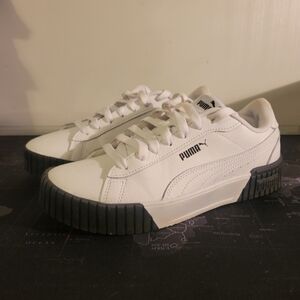 Puma White Sneakers with Black Soles